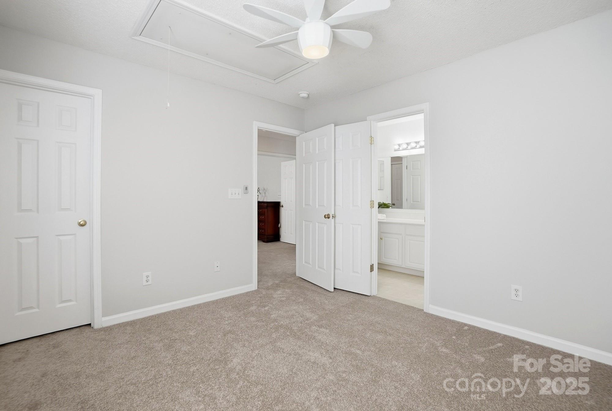 143 Amber Woods Drive Tega Cay, SC 29708 - Photo 31 of 46 an empty room with a bathroom
