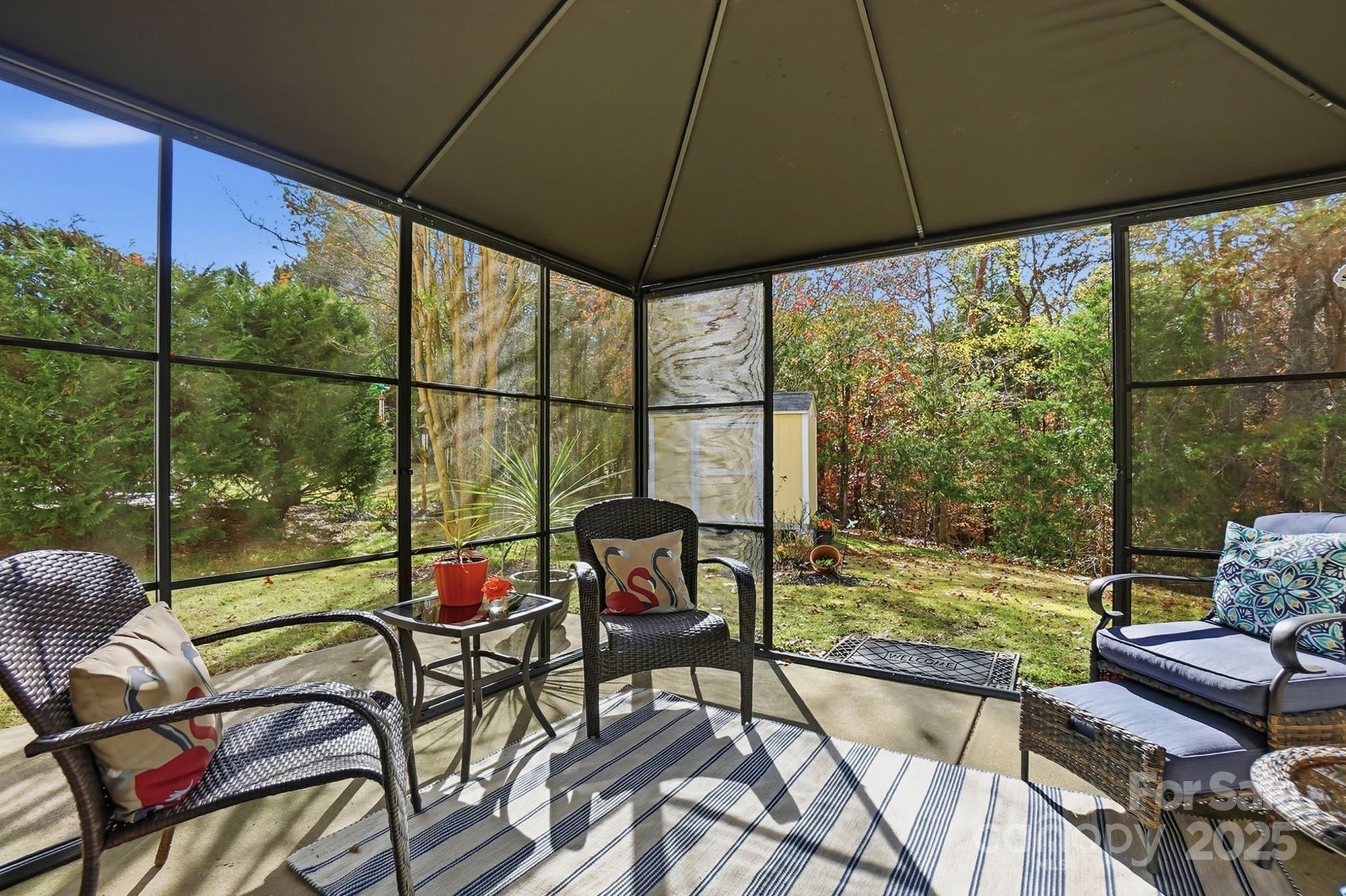 143 Amber Woods Drive Tega Cay, SC 29708 - Photo 39 of 46 a view of a outdoor seating area with furniture