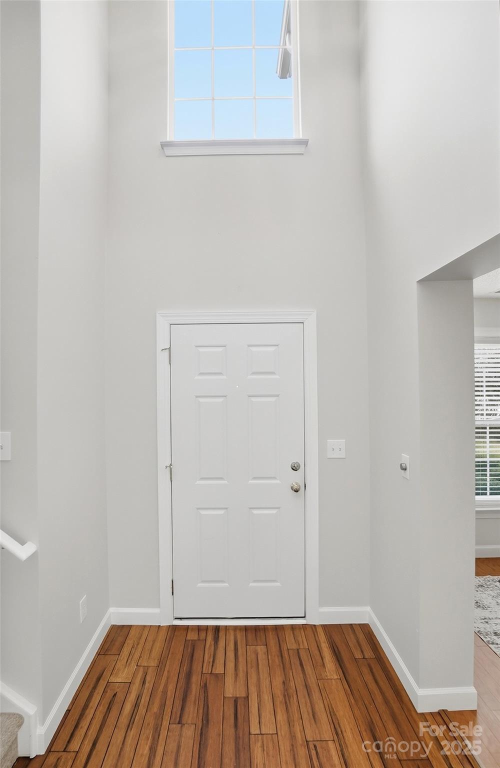 143 Amber Woods Drive Tega Cay, SC 29708 - Photo 5 of 46 a view of room with wooden floor and closet