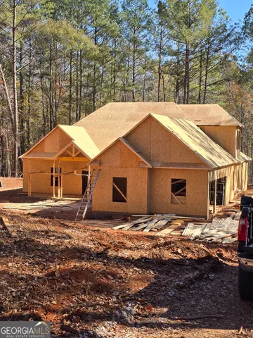 a backyard of a house with yard and trees