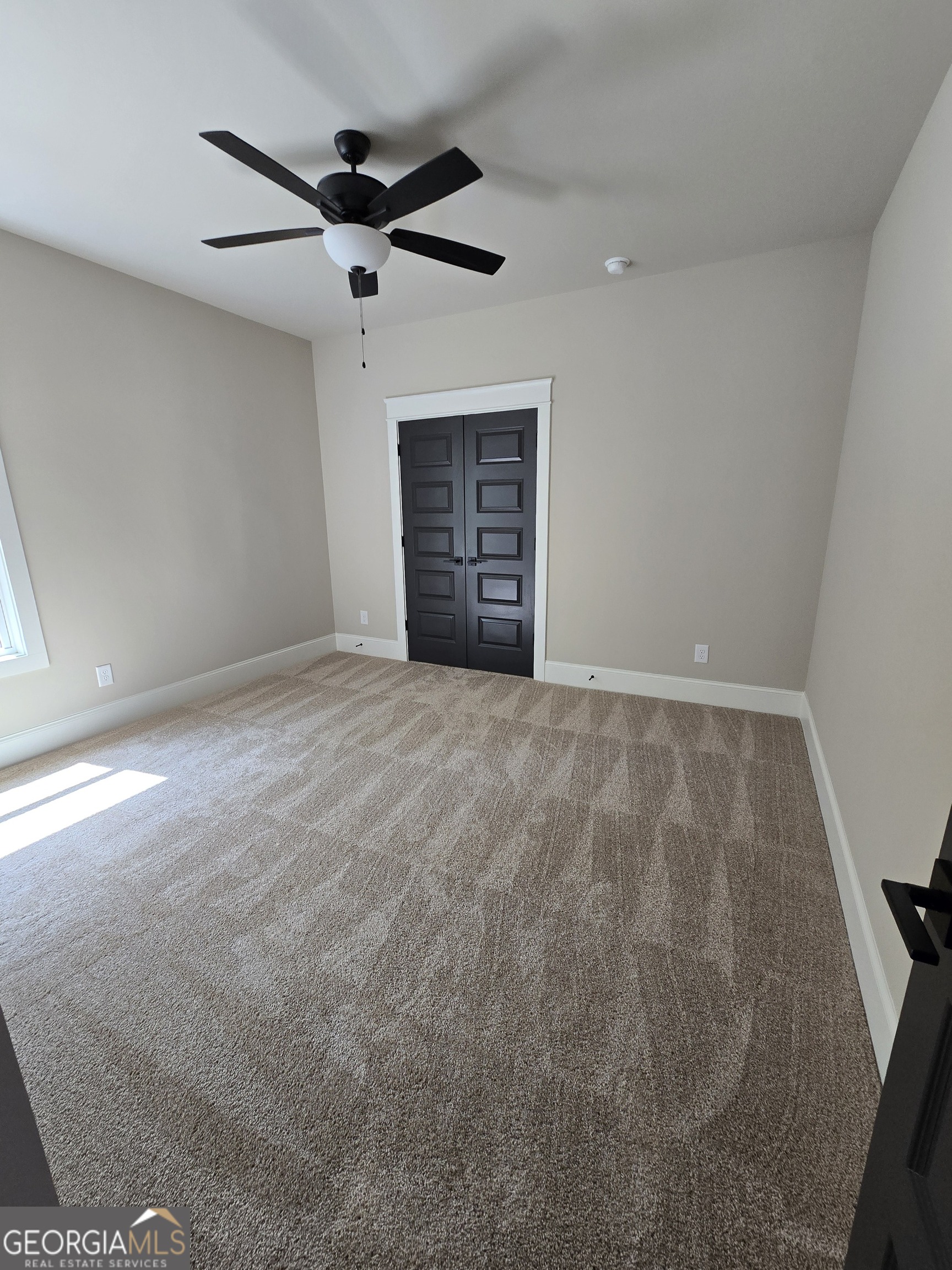 1620 Bar J Road Temple, GA 30179 - Photo 37 of 73 a view of an empty room with a ceiling fan