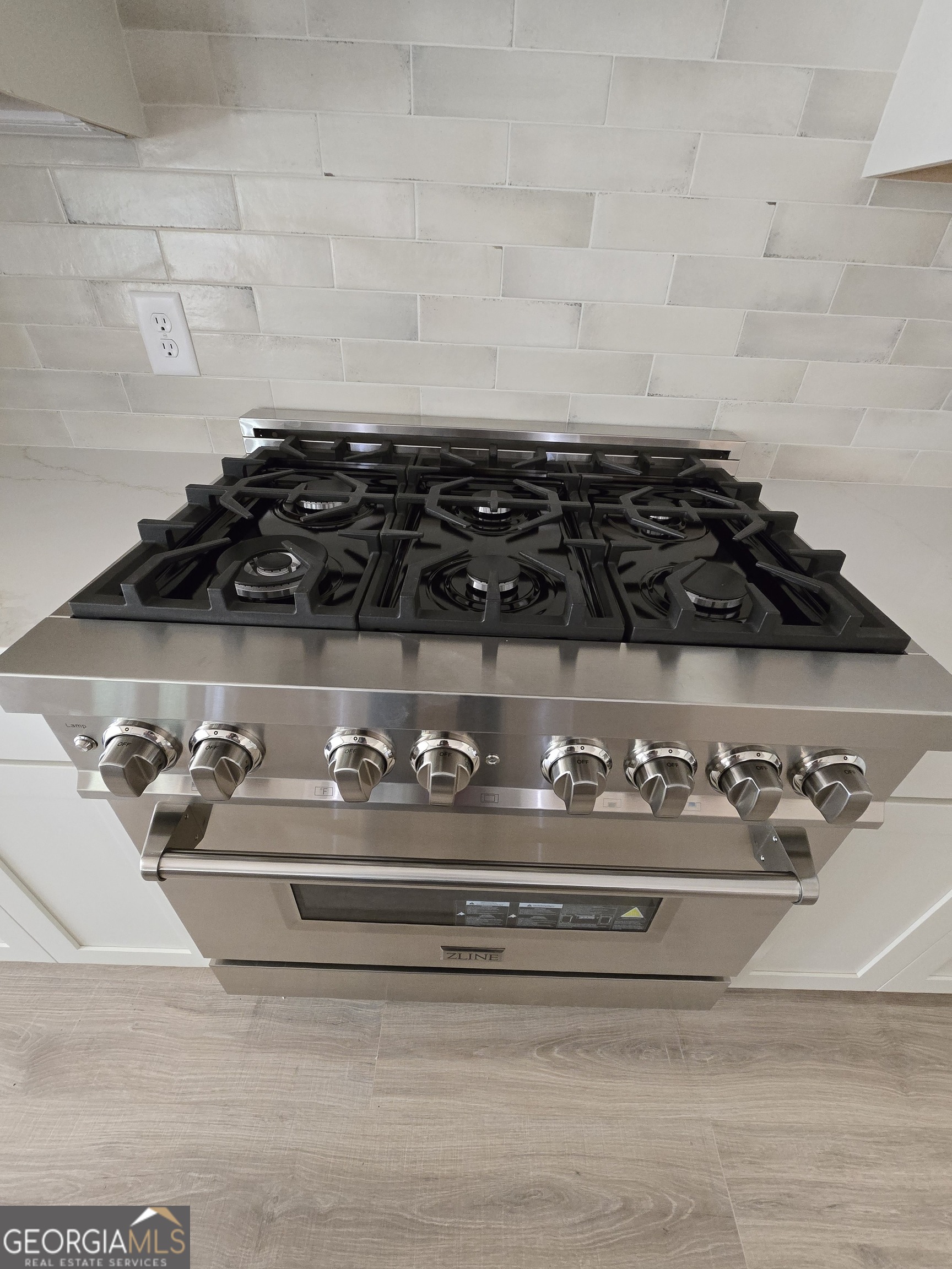 1620 Bar J Road Temple, GA 30179 - Photo 39 of 54 a close view of stove top oven