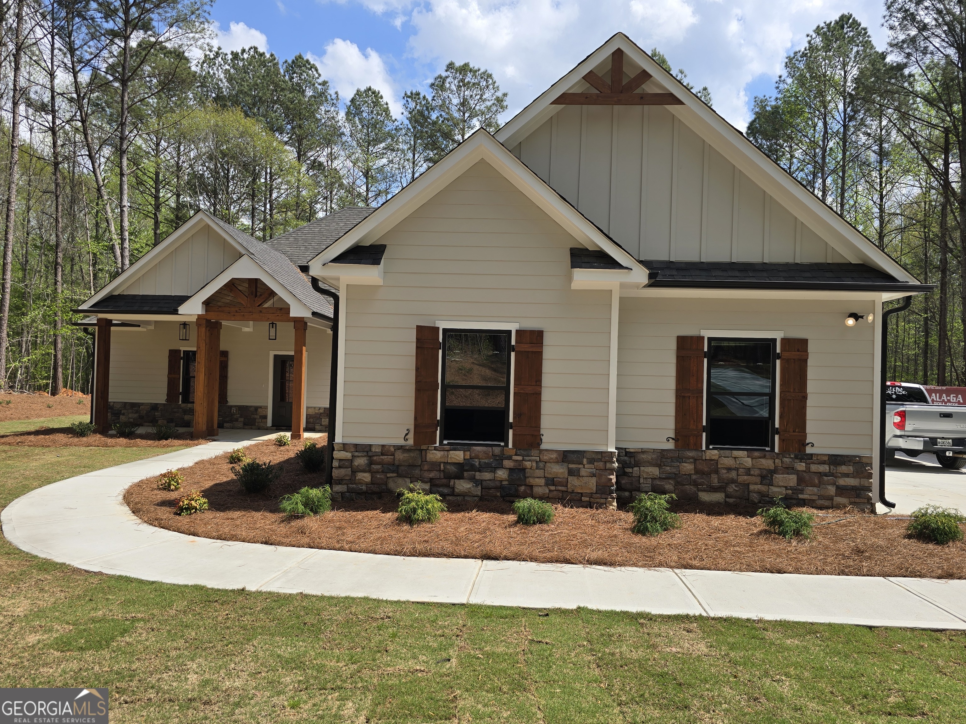 1620 Bar J Road Temple, GA 30179 - Photo 4 of 73 a front view of house with yard and trees in the background