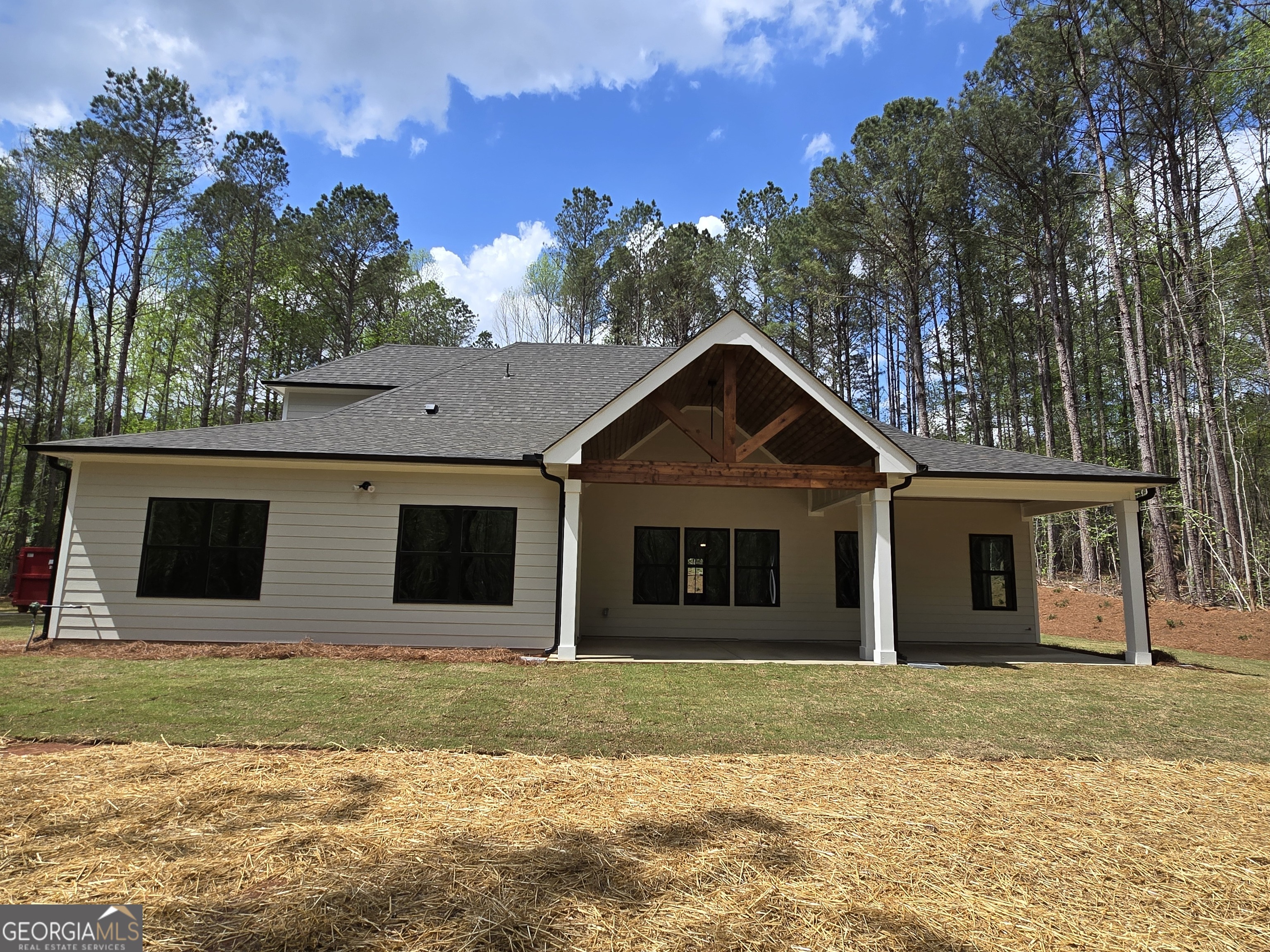 1620 Bar J Road Temple, GA 30179 - Photo 53 of 54 a front view of a house with a yard and garage