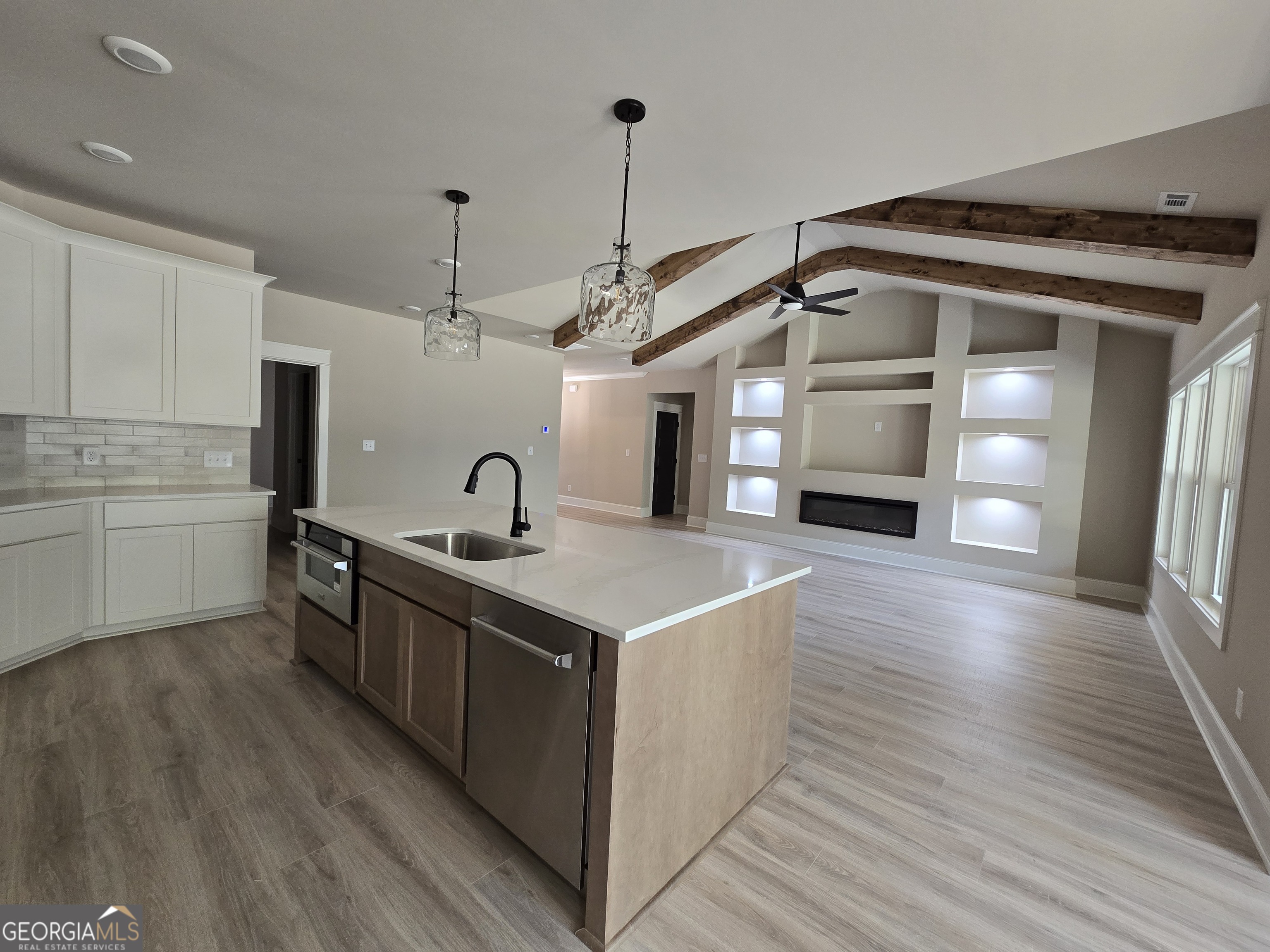 1620 Bar J Road Temple, GA 30179 - Photo 59 of 73 a kitchen with kitchen island a sink stainless steel appliances and cabinets