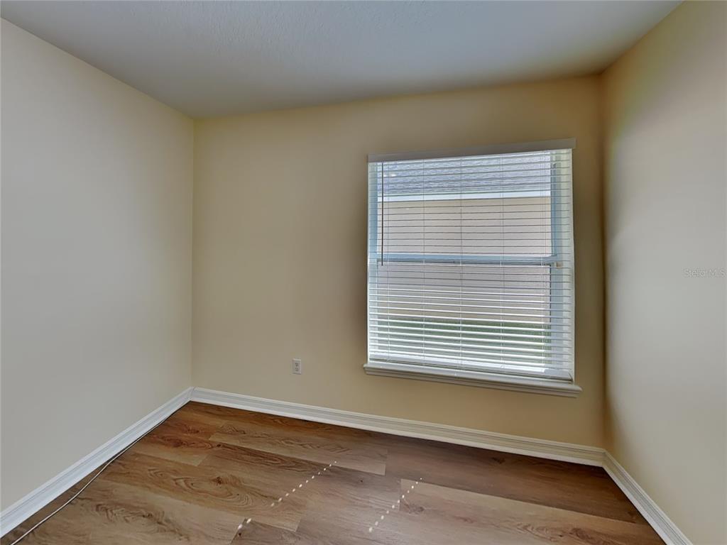 3024 Andover Court Mount Dora, FL 32757 - Photo 14 of 17 a view of a small space with a window