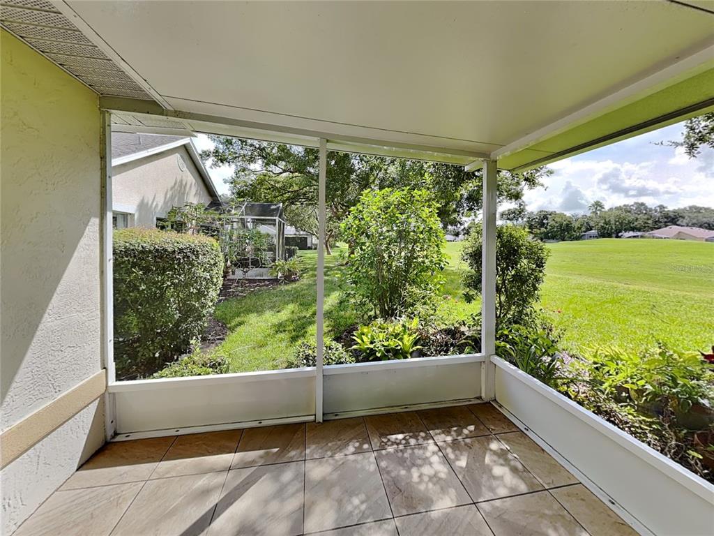 3024 Andover Court Mount Dora, FL 32757 - Photo 16 of 17 a view of a lot of a garden from a window