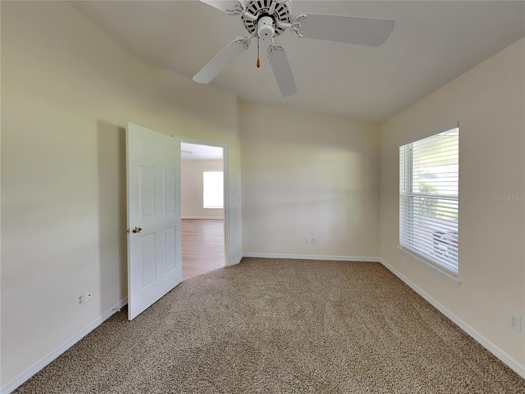 3024 Andover Court Mount Dora, FL 32757 - Photo 8 of 17 a view of an empty room with a window
