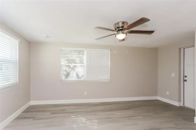 a bathroom with a sink mirror toilet and bathtub