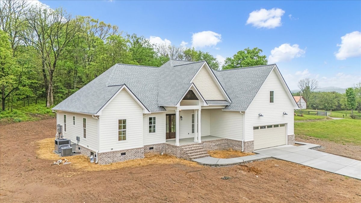 50 Lindsley Road Lebanon, TN 37090 - Photo 5 of 78 a view of a house with backyard and garden