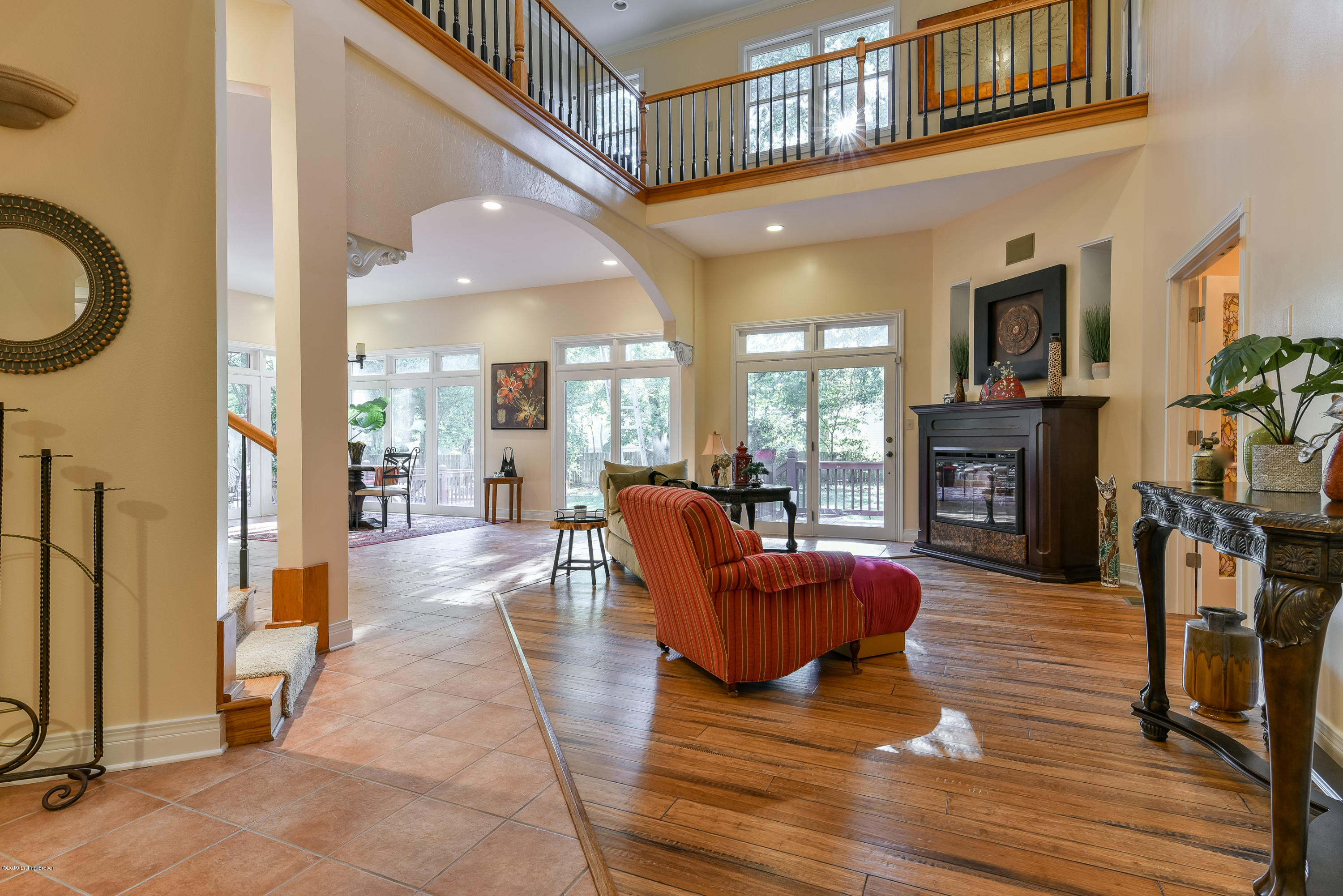 11511 Cedardale Road Anchorage, KY 40223 - Photo 45 of 99 The Great Room boasts a two-story ceiling and is well lit with natural lighting from skylights as well as recessed lighting, sconce lights and chandeliers