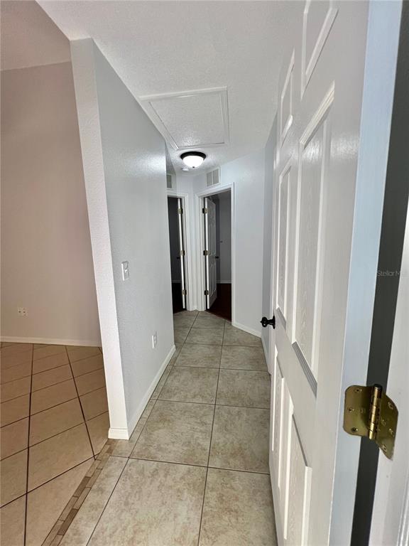 7469 Pond Circle Spring Hill, FL 34606 - Photo 11 of 22 a view of a hallway