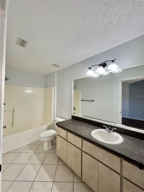 7469 Pond Circle Spring Hill, FL 34606 - Photo 18 of 22 a bathroom with a sink and a mirror