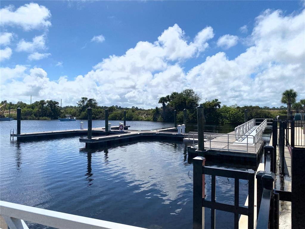 11 Rio Vista Drive Palm Coast, FL 32137 - Photo 34 of 38 a view of swimming pool with seating area and barbeque oven