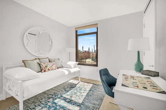 a bathroom with a granite countertop sink a toilet and bathtub