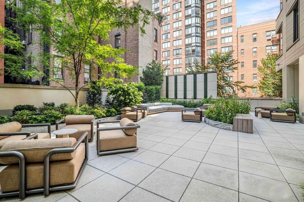 212 West 95th Street, Unit 17B Manhattan, NY 10025 - Photo 12 of 24 a view of a patio with couches and potted plants