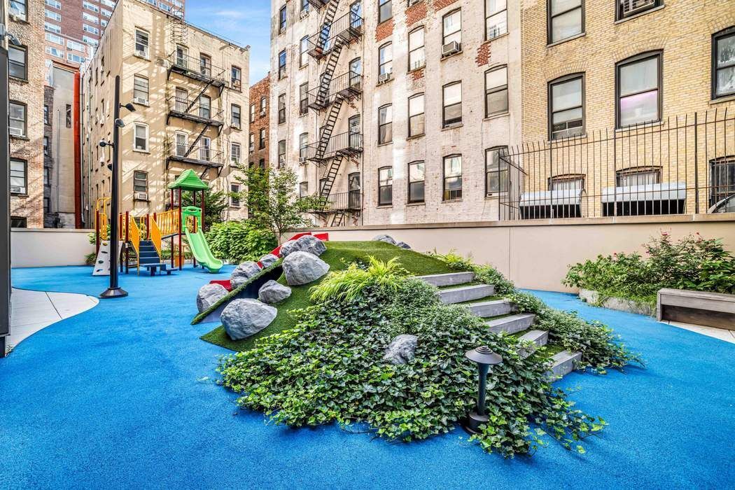 212 West 95th Street, Unit 17B Manhattan, NY 10025 - Photo 13 of 24 a view of a building with garden