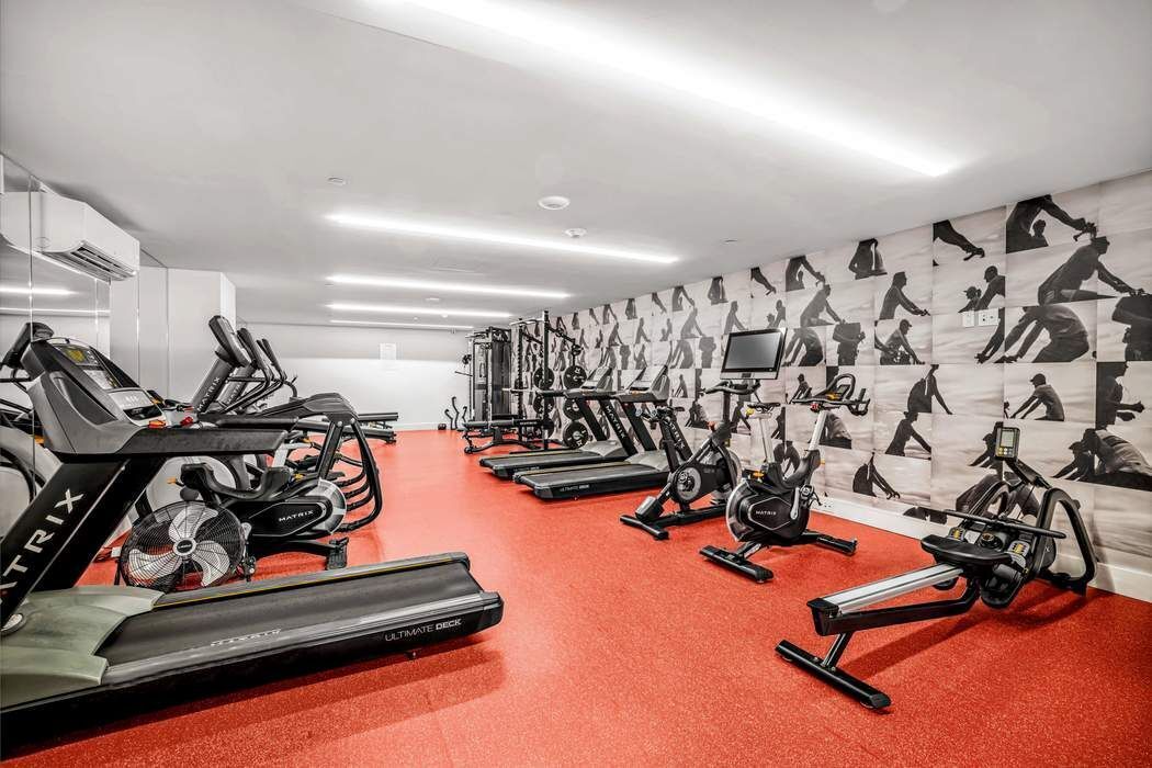 212 West 95th Street, Unit 17B Manhattan, NY 10025 - Photo 15 of 24 a view of a room with gym equipment