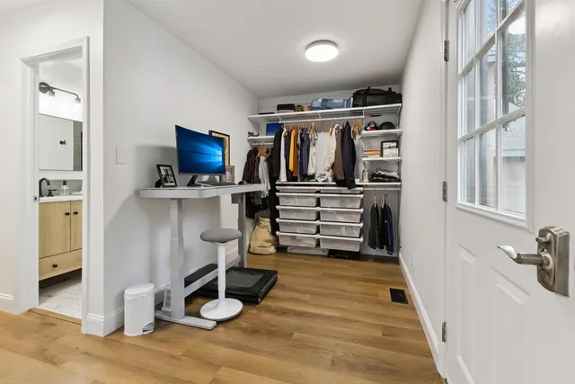 a kitchen with stainless steel appliances granite countertop a refrigerator and stove