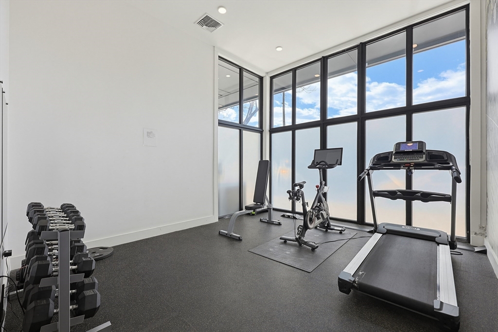 30 Penniman Road, Unit 605 Boston, MA 02134 - Photo 13 of 19 a view of a room with gym equipment