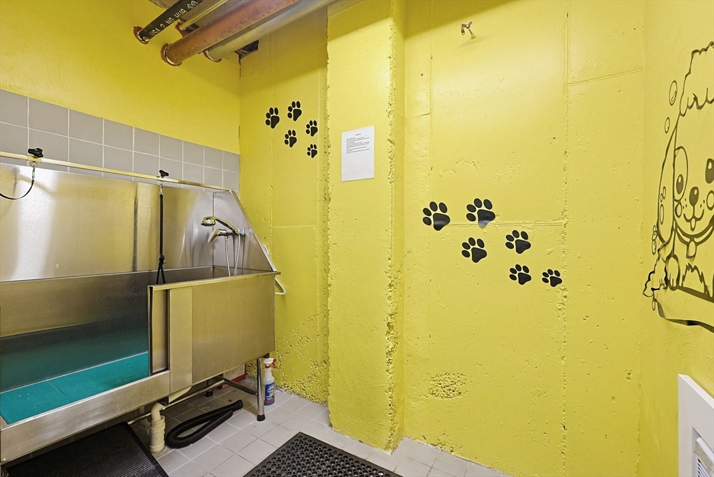 30 Penniman Road, Unit 605 Boston, MA 02134 - Photo 16 of 19 a view of a bathroom with a shower