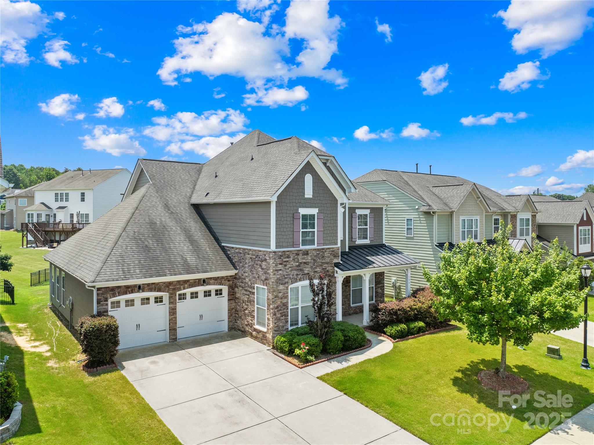 586 Brookhaven Drive Fort Mill, SC 29708 - Photo 2 of 47 a front view of a house with yard porch and outdoor seating