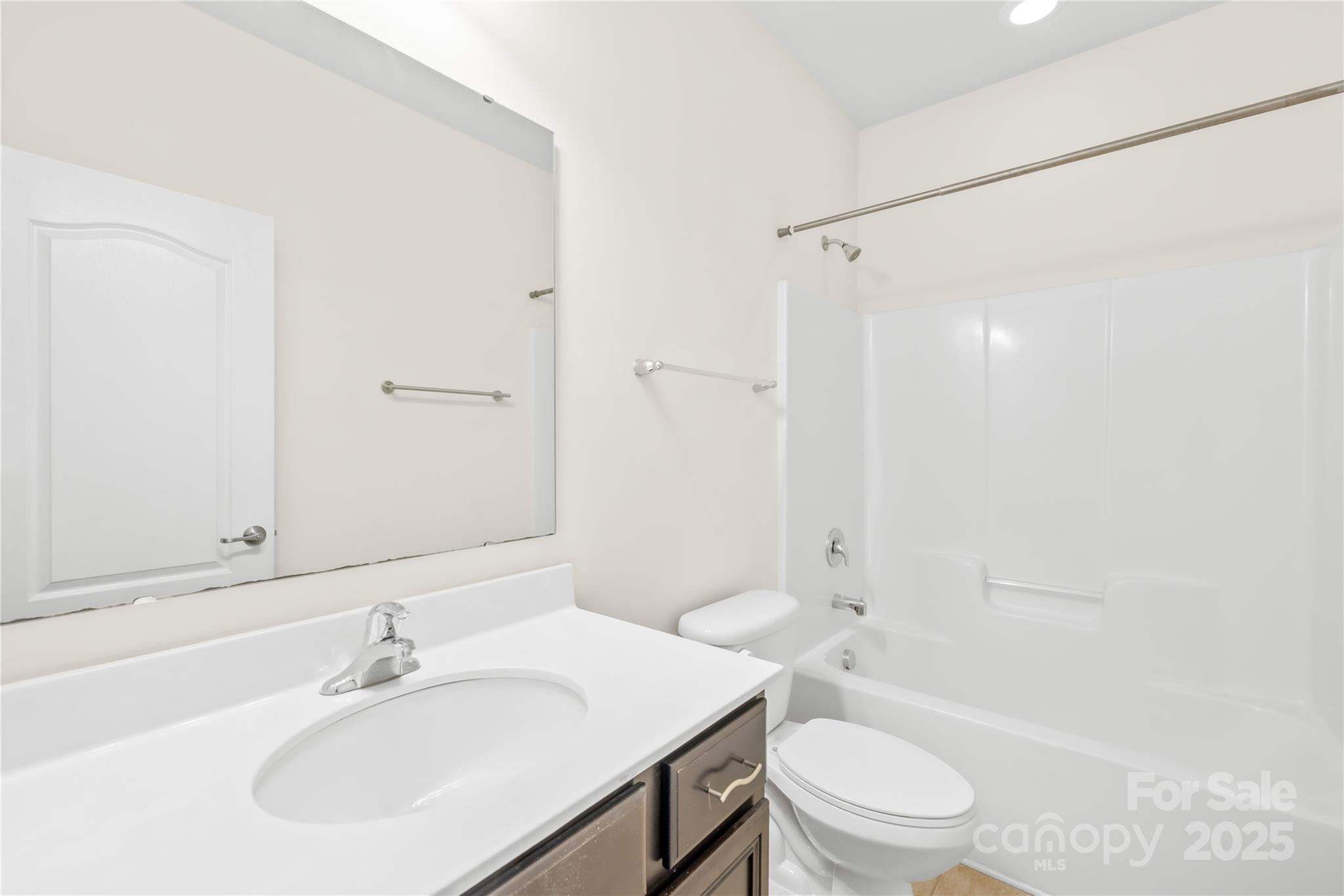 586 Brookhaven Drive Fort Mill, SC 29708 - Photo 29 of 47 a bathroom with a sink a toilet and shower
