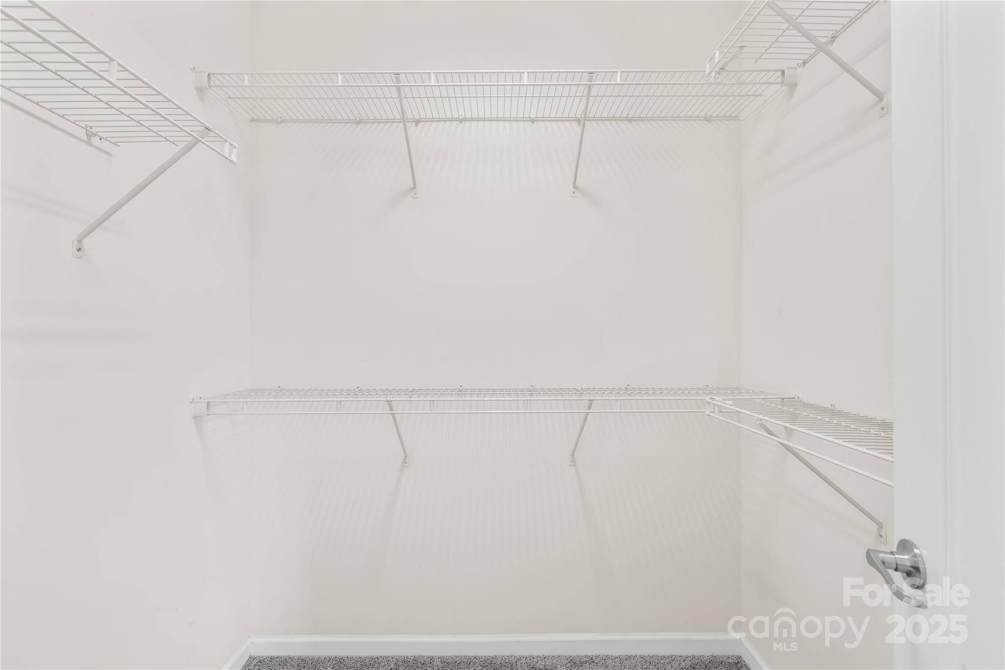 586 Brookhaven Drive Fort Mill, SC 29708 - Photo 36 of 47 a view of a room with racks on the wall