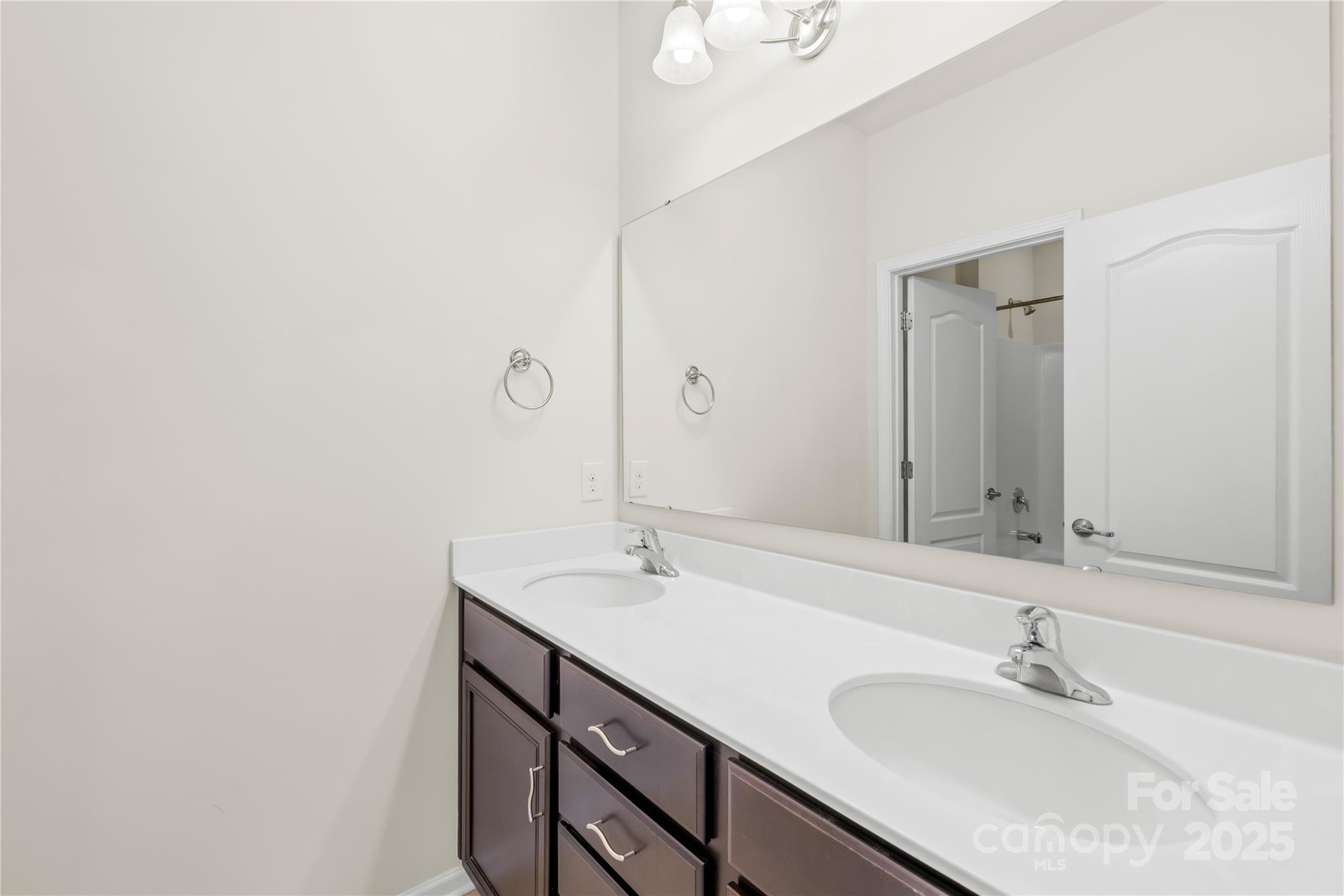 586 Brookhaven Drive Fort Mill, SC 29708 - Photo 39 of 47 a bathroom with a sink and a mirror
