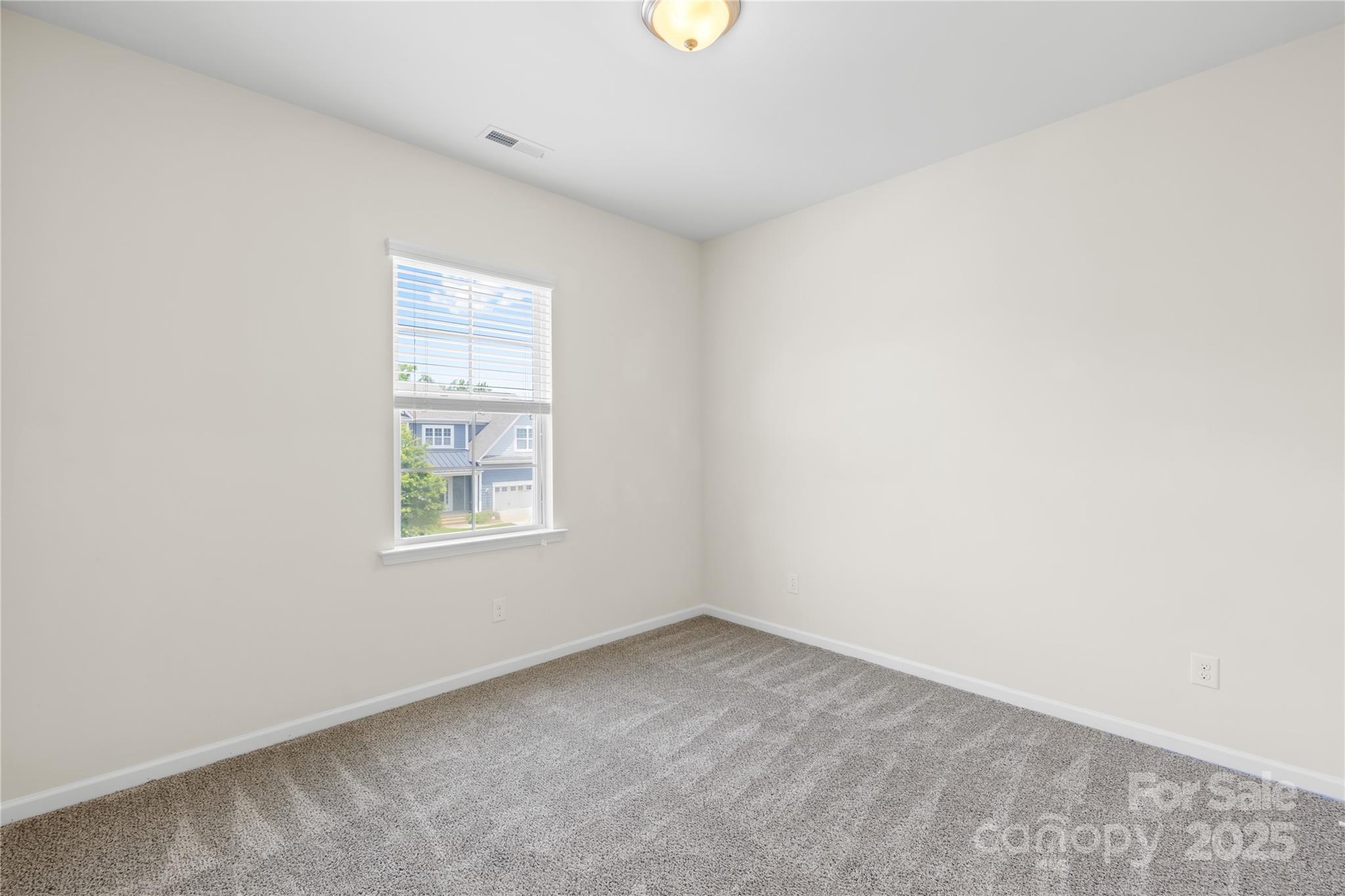 586 Brookhaven Drive Fort Mill, SC 29708 - Photo 41 of 47 an empty room with windows