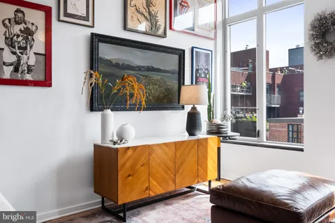 a living room with a couch and a table