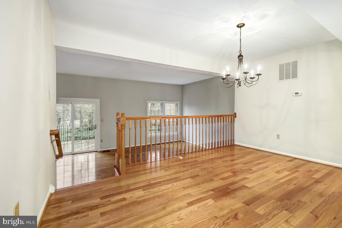 2167 Greenkeepers Court Reston, VA 20191 - Photo 17 of 51 Dining Room with Backyard Views