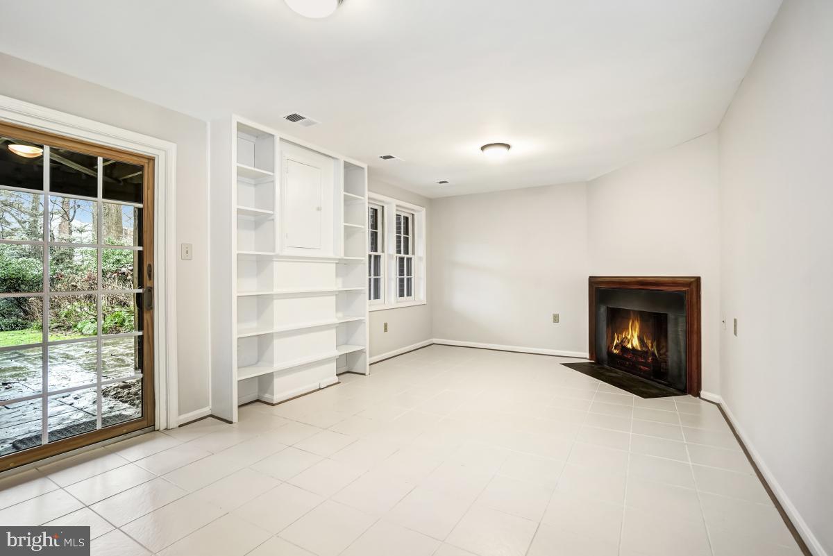 2167 Greenkeepers Court Reston, VA 20191 - Photo 42 of 51 Rec Room with Wood burning Fireplace