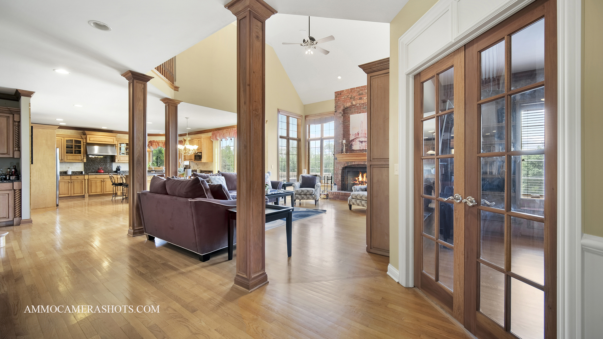 39W555 Walt Whitman Road St. Charles, IL 60175 - Photo 13 of 52 a living room with furniture large windows and wooden floor