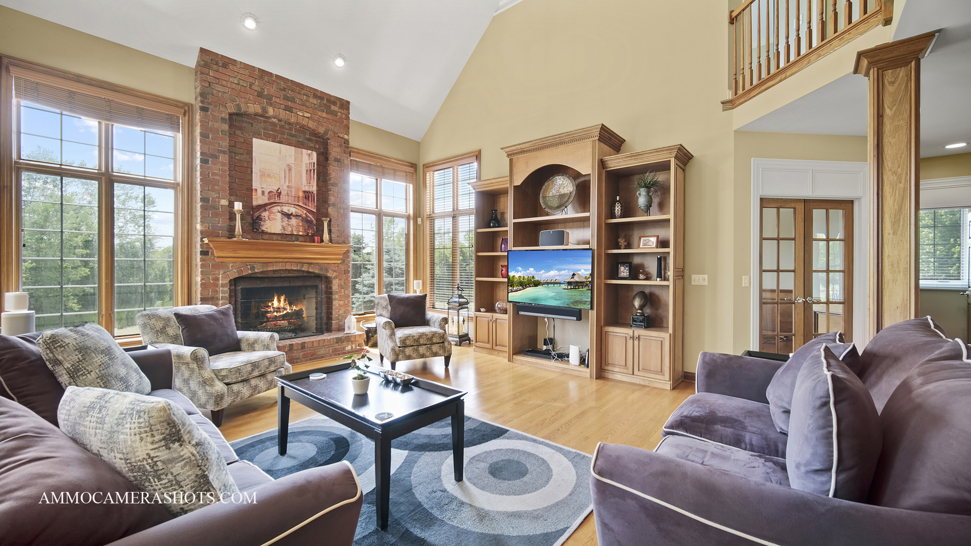 39W555 Walt Whitman Road St. Charles, IL 60175 - Photo 14 of 52 a living room with furniture a fireplace and a large window