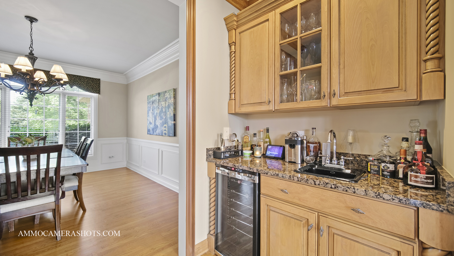 39W555 Walt Whitman Road St. Charles, IL 60175 - Photo 21 of 52 a kitchen with stainless steel appliances granite countertop a sink dishwasher and cabinets with wooden floor