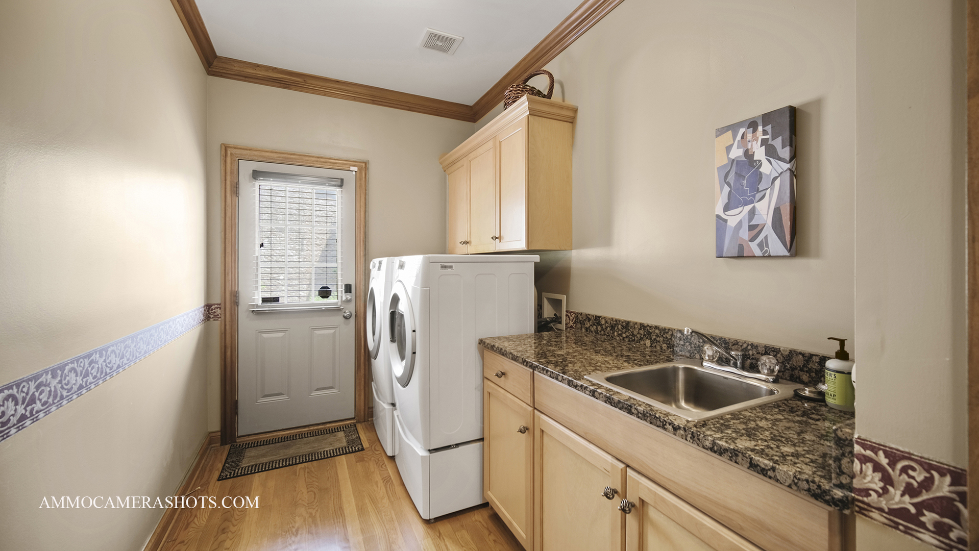 39W555 Walt Whitman Road St. Charles, IL 60175 - Photo 23 of 52 a kitchen with a refrigerator and a sink