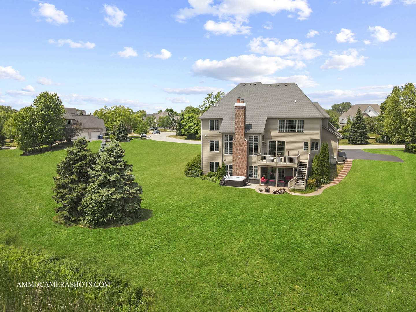 39W555 Walt Whitman Road St. Charles, IL 60175 - Photo 50 of 52 a view of a house with a yard