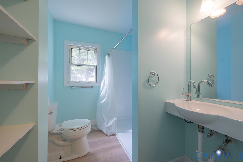 1881 Fairport Road Reedville, VA 22539 - Photo 28 of 54 Wall-mounted vanity sink, polished chrome faucet,