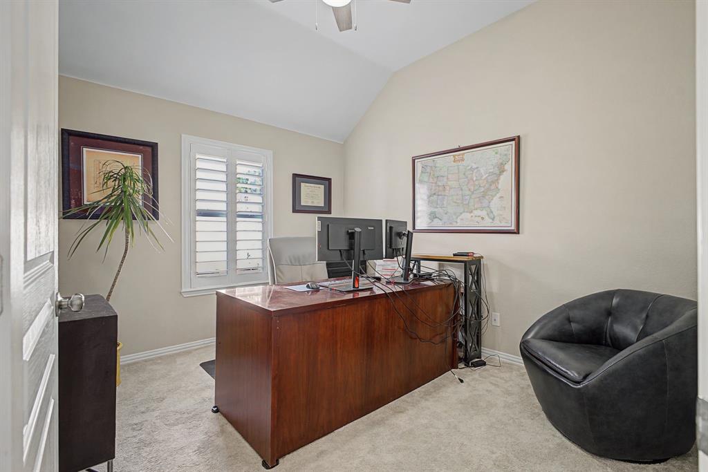 505 Scenic Ranch Circle Fairview, TX 75069 - Photo 15 of 32 a work room with furniture and a flat screen tv