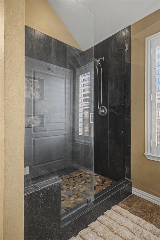 505 Scenic Ranch Circle Fairview, TX 75069 - Photo 18 of 32 a bathroom with a shower and a sink