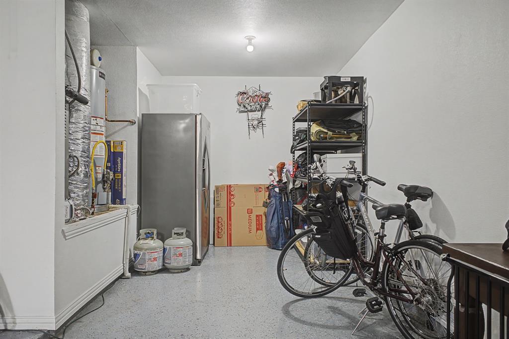 505 Scenic Ranch Circle Fairview, TX 75069 - Photo 22 of 32 a view of a livingroom with furniture gym equipment