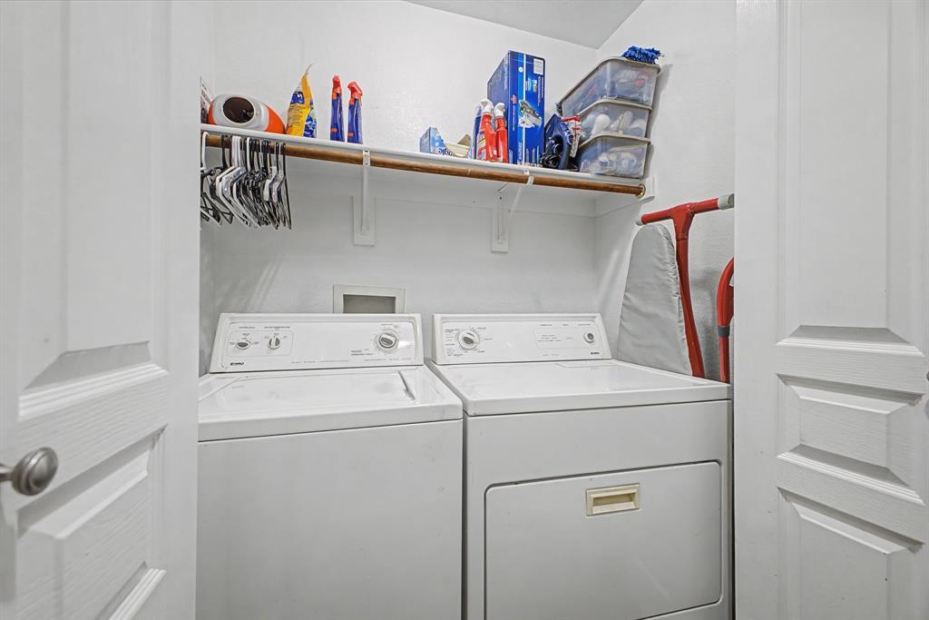 505 Scenic Ranch Circle Fairview, TX 75069 - Photo 23 of 32 a utility room with dryer and washer
