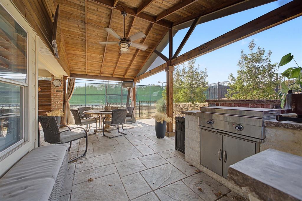 505 Scenic Ranch Circle Fairview, TX 75069 - Photo 26 of 32 a view of a patio with table and chairs and potted plants