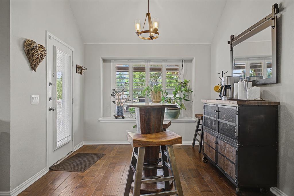505 Scenic Ranch Circle Fairview, TX 75069 - Photo 10 of 32 a view of a dining room with furniture window and wooden floor