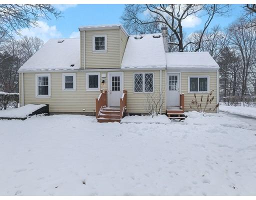 37 Harwood Road Natick, MA 01760 - Photo 15 of 18 a view of a white house with a yard and sitting area