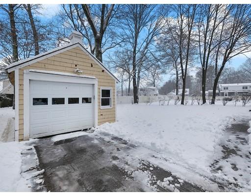 37 Harwood Road Natick, MA 01760 - Photo 16 of 18 a view of white house with a snow in the yard