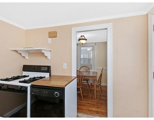 37 Harwood Road Natick, MA 01760 - Photo 8 of 18 a kitchen with a stove and a refrigerator