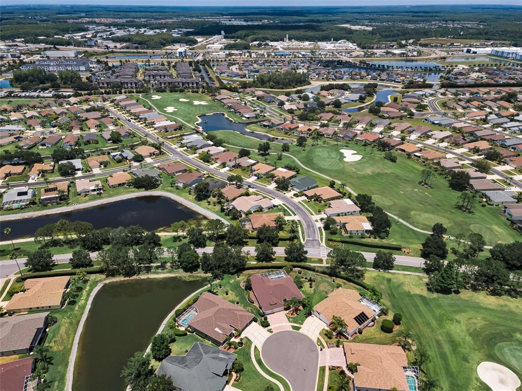11917 Hadleigh Way Trinity, FL 34655 - Photo 57 of 84 an aerial view of a house with a lake view
