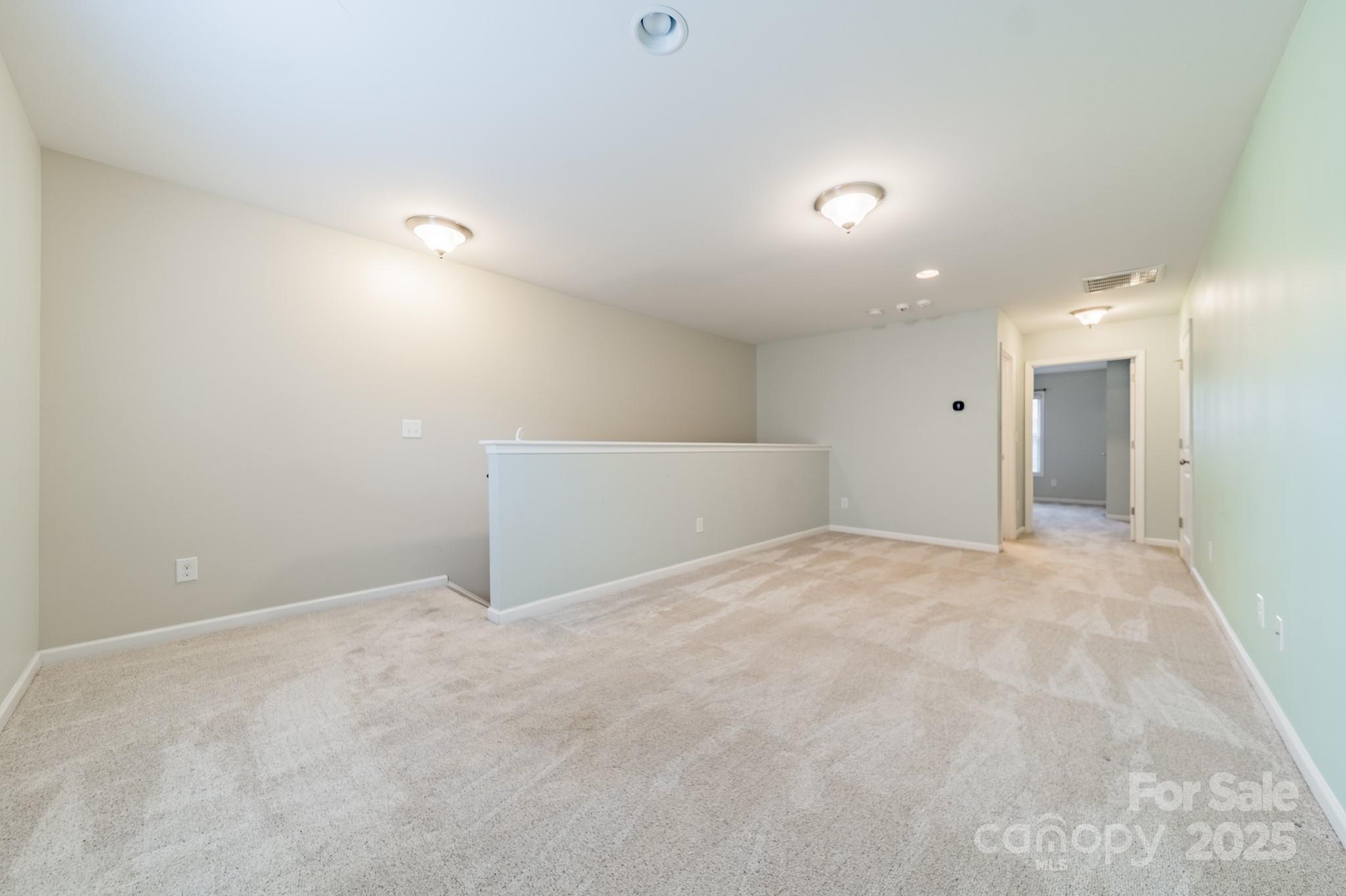 3419 Streamside Drive, Unit 463 Davidson, NC 28036 - Photo 26 of 43 a view of an empty room